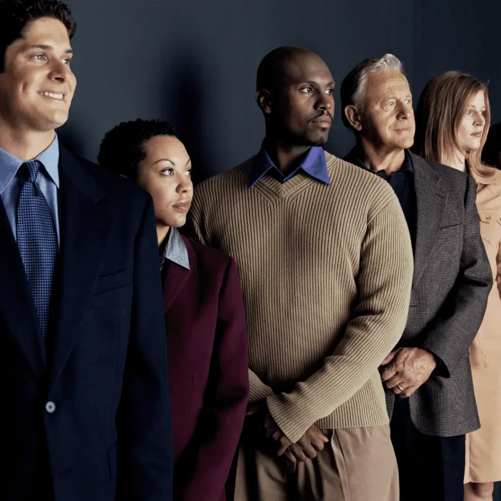 professionals standing in a line getting a photo